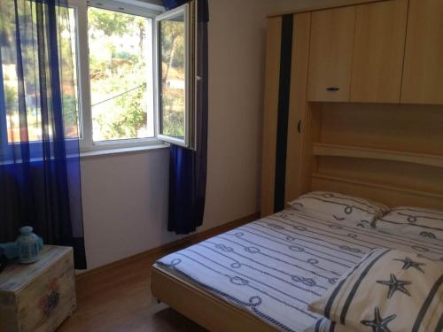 Apartments with a parking space Podgora, Makarska - 12306