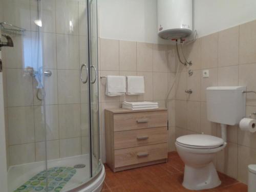 Koupelna v ubytování Apartments by the sea Businci, Ciovo - 12414