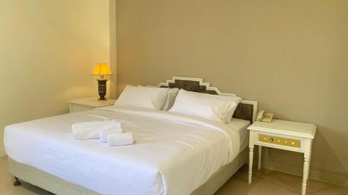 Katil atau katil-katil dalam bilik di SWISS AVENUE HOTEL