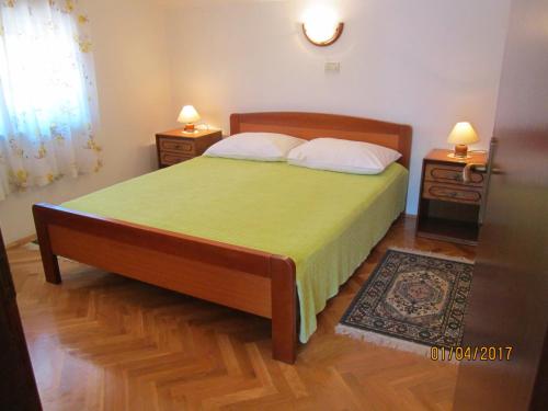 A bed or beds in a room at Apartments with a swimming pool Jadranovo, Crikvenica - 12921