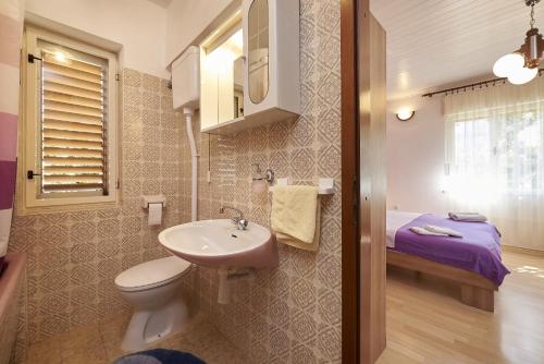 Koupelna v ubytování Apartments and rooms with parking space Trogir - 13102