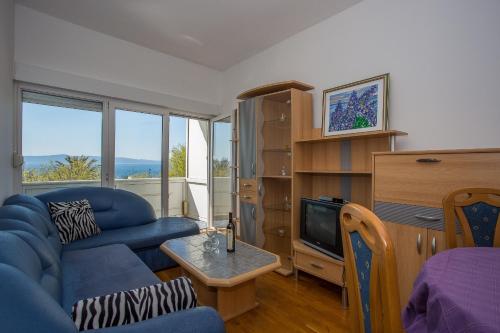 Apartments by the sea Podgora, Makarska - 13086