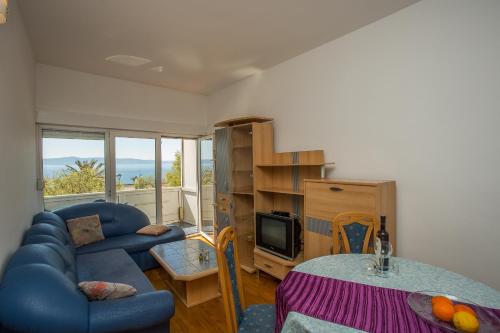 Apartments by the sea Podgora, Makarska - 13086