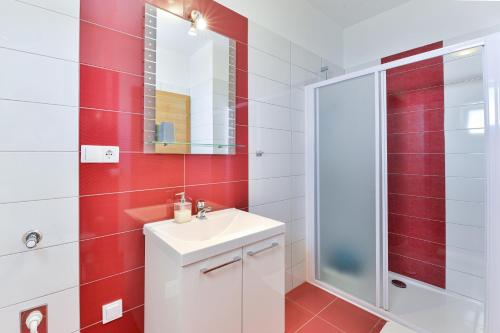 Kúpeľňa v ubytovaní Apartment Nin 13172c
