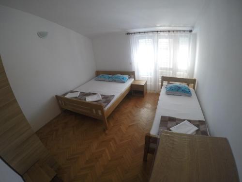 Postel nebo postele na pokoji v ubytování Rooms with WiFi Biograd na Moru, Biograd - 13281