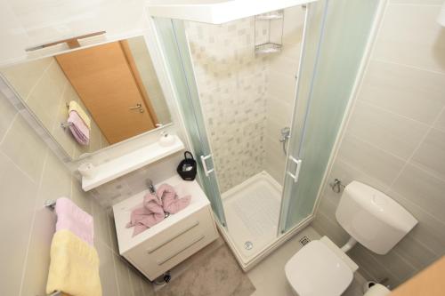 Et badeværelse på Apartments with parking space Orebic, Peljesac - 10097