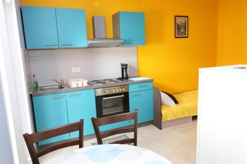 Η κουζίνα ή μικρή κουζίνα στο Apartments with a parking space Novalja, Pag - 13497