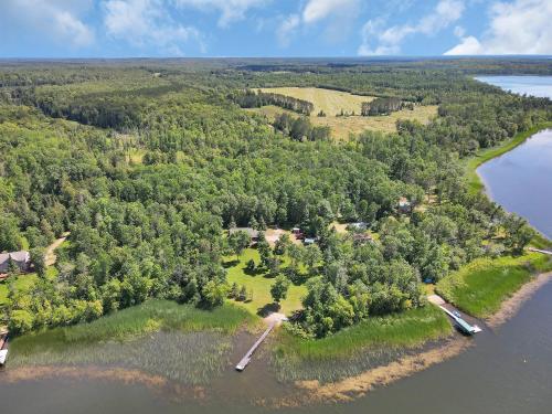 an aerial view of an island in the water at Blue Moon Resort & Motel in Hill City