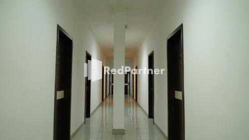 Gambar di galeri bagi Wisma Sederhana Medan Mitra RedDoorz di Medan