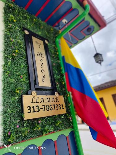 a cake with a flag and a sign on it at Casa Boutique Hotel in Salento