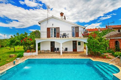 Family friendly house with a swimming pool Basarinka, Porec - 14663