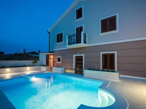 Fotografia z galérie ubytovania Holiday house with a swimming pool Preko, Ugljan - 14707 v destinácii Preko