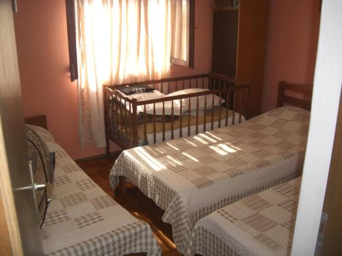 Postel nebo postele na pokoji v ubytování Apartments by the sea Cove Donja Kruscica - Donja Krusica, Solta - 14709