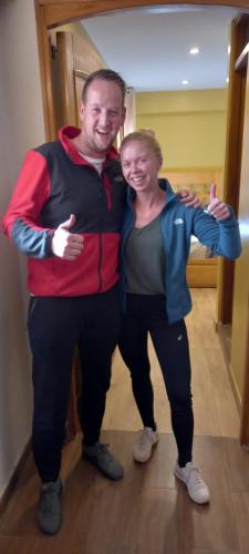 a man and a woman posing for a picture at LAGUNA HOUSE in Huaraz