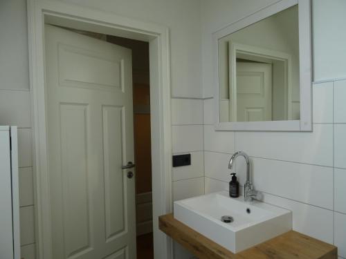 Bilik mandi di Hygge Hus Langstedt - modern und stilvoll eingerichtete Ferienwohnung für 2 Personen auf dem Lande