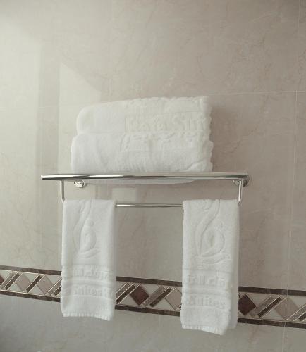 two towels on a towel rack in a bathroom at Rafa Homes in Riyadh