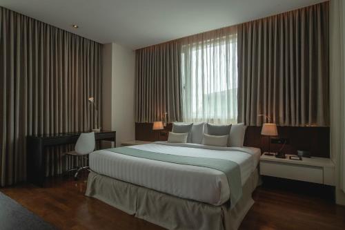 Postel nebo postele na pokoji v ubytování Residence26