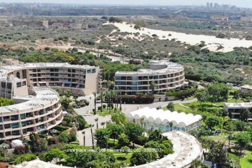 an aerial view of a campus with buildings at lasuita- exclusive suites cesarea- sea view suite in Caesarea
