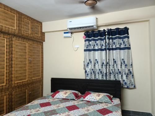 Postel nebo postele na pokoji v ubytování ADVIK HOMESTAYS