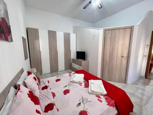 Una cama o camas en una habitación de Casa Planet