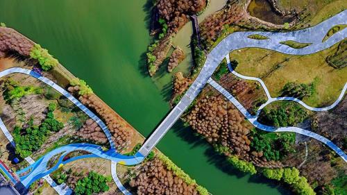 an aerial view of a river and a road at Holiday Inn Shanghai Dishui Lake by IHG in Nanhui