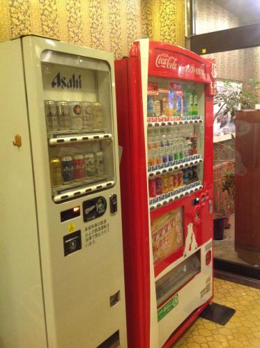 two vending machines are next to each other at Tabist THE GREEN OTARU in Otaru
