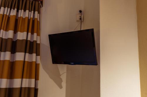 Hotel Zeusにあるテレビまたはエンターテインメントセンター