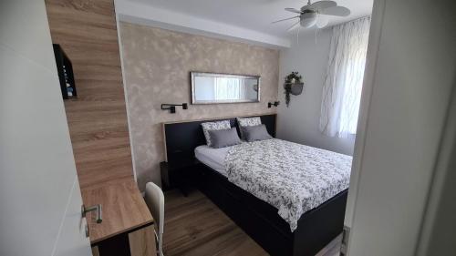 Postel nebo postele na pokoji v ubytování Vila Primorka Apartmani Oleander