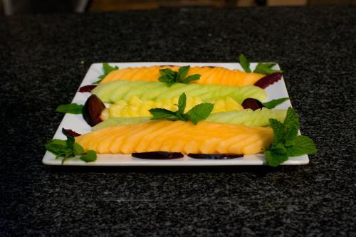 a plate with different types of vegetables on a table at Manong Game Lodge in Gaborone