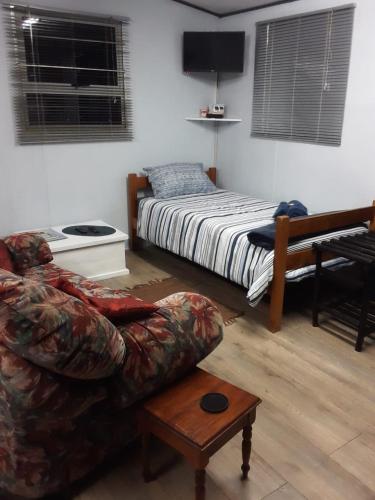Ένα ή περισσότερα κρεβάτια σε δωμάτιο στο Nadine's Self - Catering Accommodation