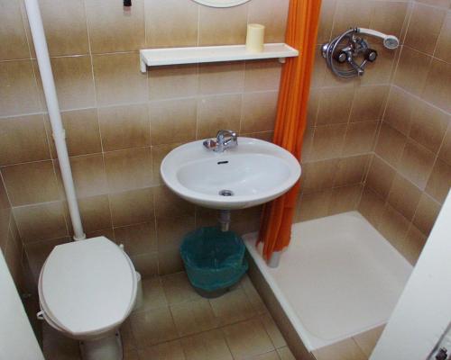 a small bathroom with a sink and a toilet at Rooms by the sea Jelsa, Hvar - 127 in Jelsa