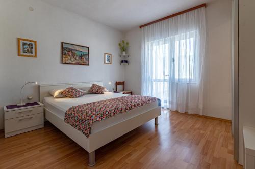 Posteľ alebo postele v izbe v ubytovaní Apartments with parking spaces Jelsa, Hvar - 134