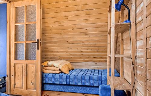a sauna with a bunk bed in a cabin at 2 Bedroom Stunning Home In Sarbinowo in Sarbinowo
