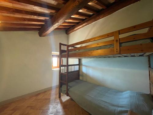 a bedroom with bunk beds in a house at Il Borgo Affitacamere in Castiglione in Teverina