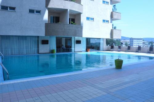 Piscine de l'établissement Elilly International Hotel ou située à proximité