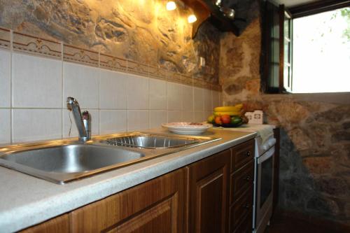 Η κουζίνα ή μικρή κουζίνα στο Villa Castello