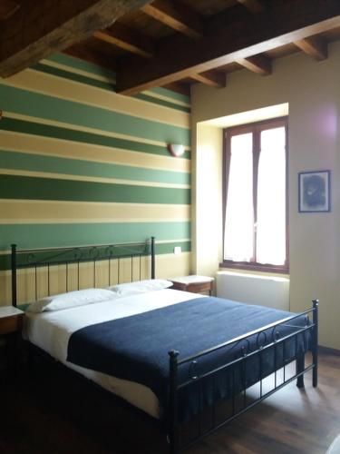 Ліжко або ліжка в номері Carlito's Trattoria con alloggio