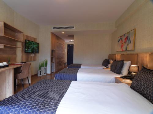 Jaff Hotels & Spa Nisantasiにあるベッド
