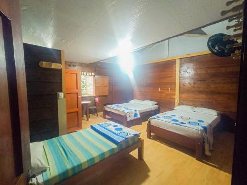 Hostal Caño Neveraにあるベッド