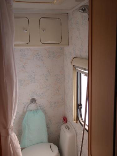 Ένα ή περισσότερα κρεβάτια σε δωμάτιο στο Camping Belle Vue