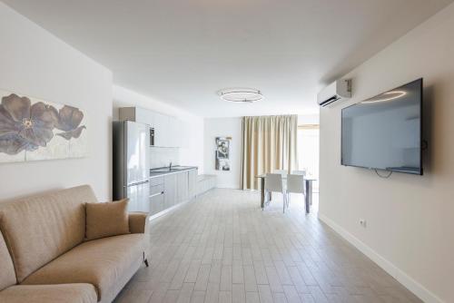 TV o dispositivi per l'intrattenimento presso Exclusive Suites Riva