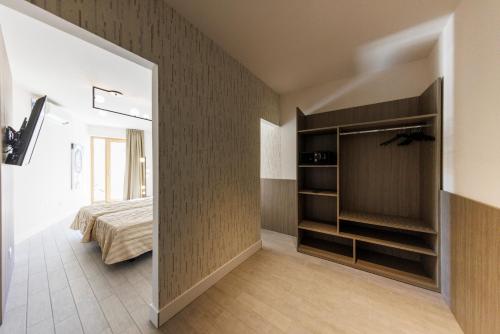 Letto o letti in una camera di Exclusive Suites Riva