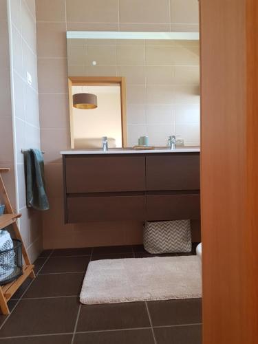 a bathroom with a sink and a mirror at JARDINS DA MARINA APARTMENT Ai in Albufeira