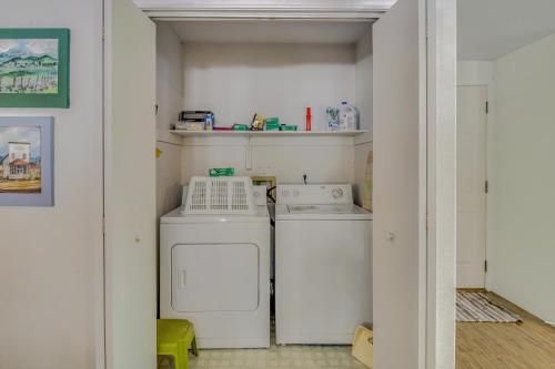 a laundry room with a washer and dryer in it at Syringa House in McCall