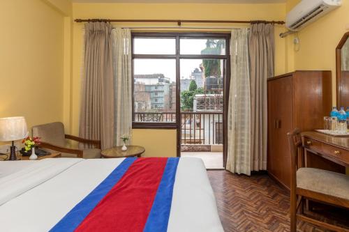 Ein Bett oder Betten in einem Zimmer der Unterkunft Hotel Thamel
