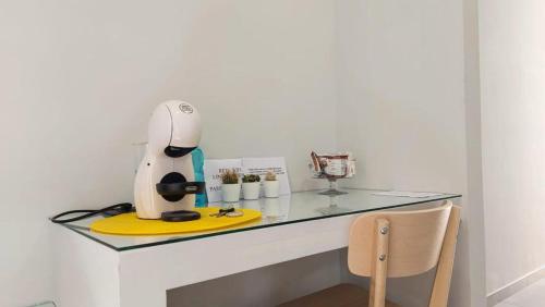 a kitchen counter with a mixer on top of it at 3B Aurora - Bed Breakfast and Boat in Salerno