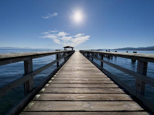 a pier stretches out into the water at Oceanside Villas in Sechelt