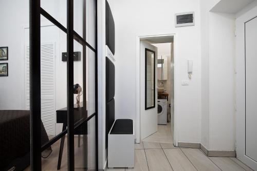 a person taking a picture of a hallway in a house at Apartment Deluxe Ana in Pula