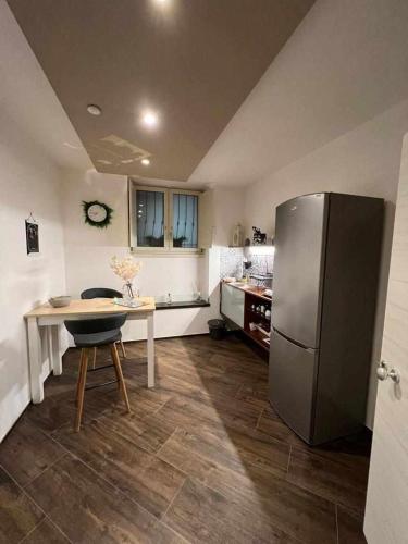 Η κουζίνα ή μικρή κουζίνα στο Al centro exclusive apartment