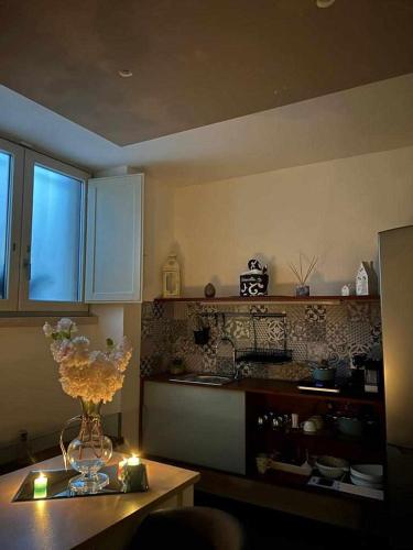 Η κουζίνα ή μικρή κουζίνα στο Al centro exclusive apartment